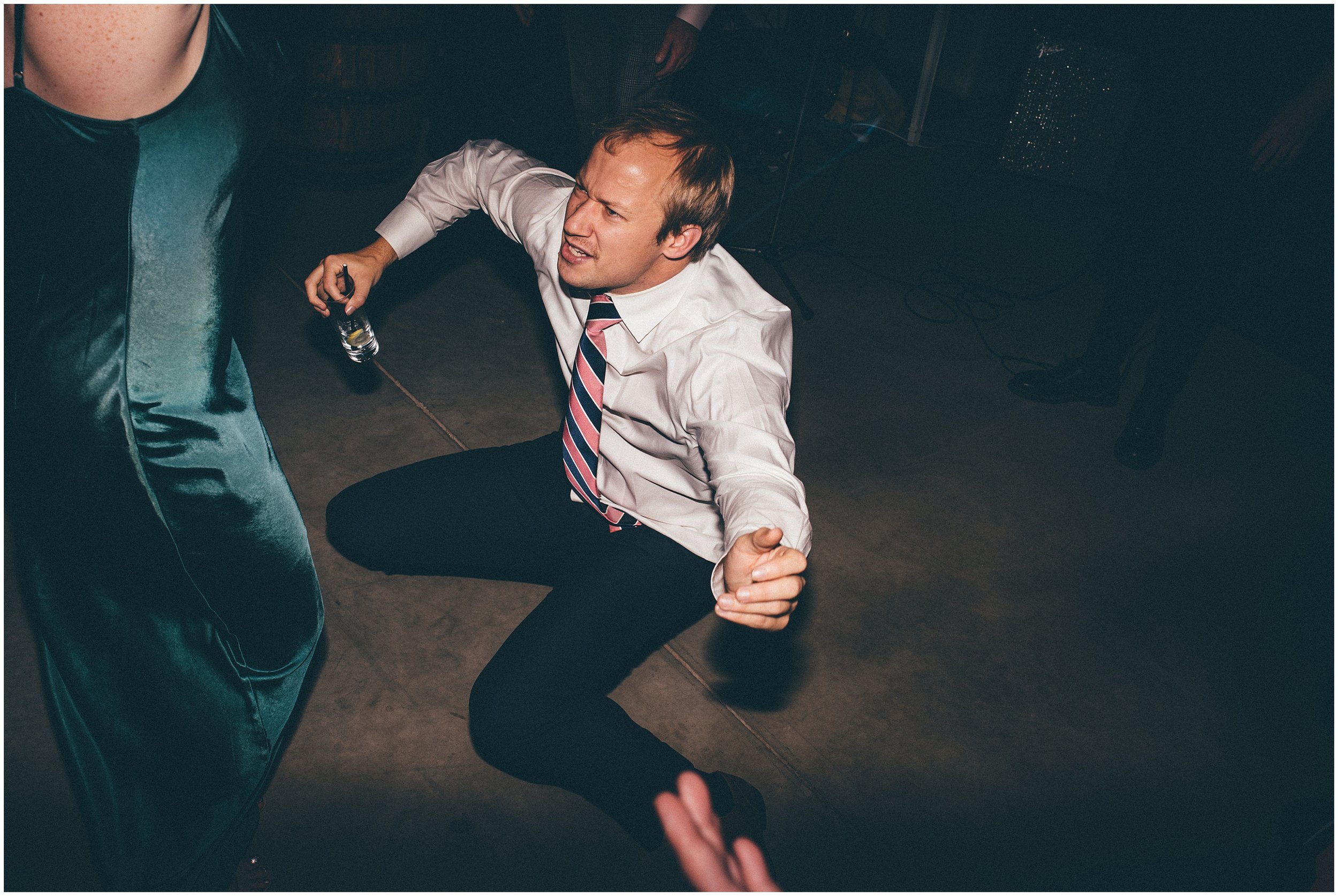 Wedding guests enjoy the dance floor at Grange Barn in Cheshire