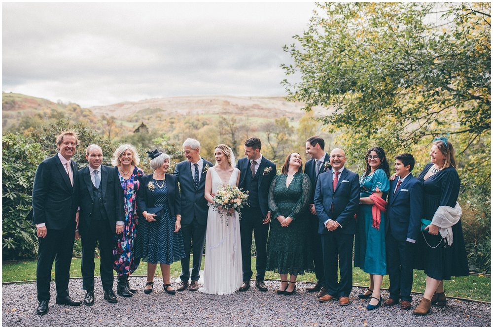 Bride and Groom with their family at Tyn Dwr Hall wedding