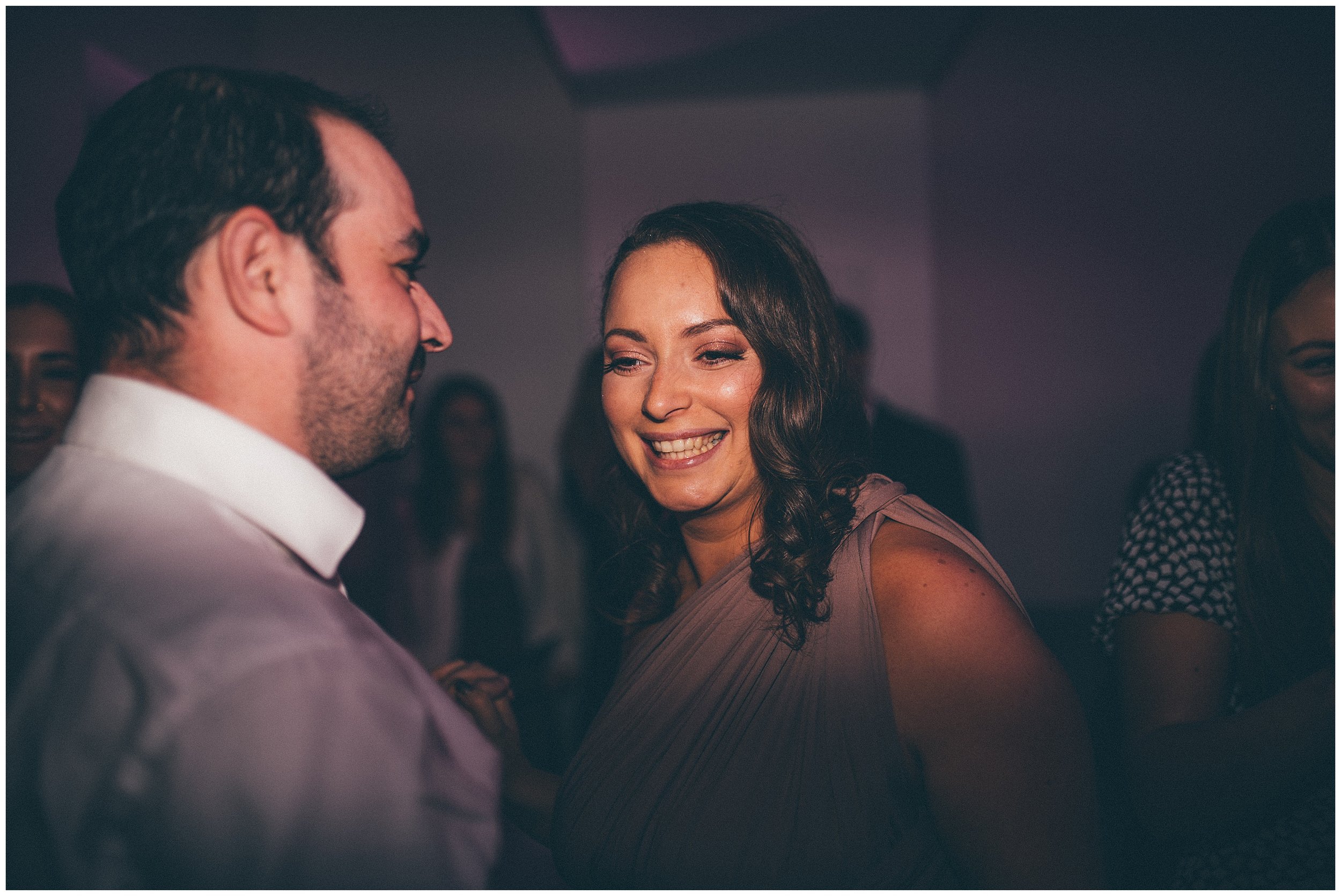 Wedding guests dance during the party at Tyn Dwr Hall