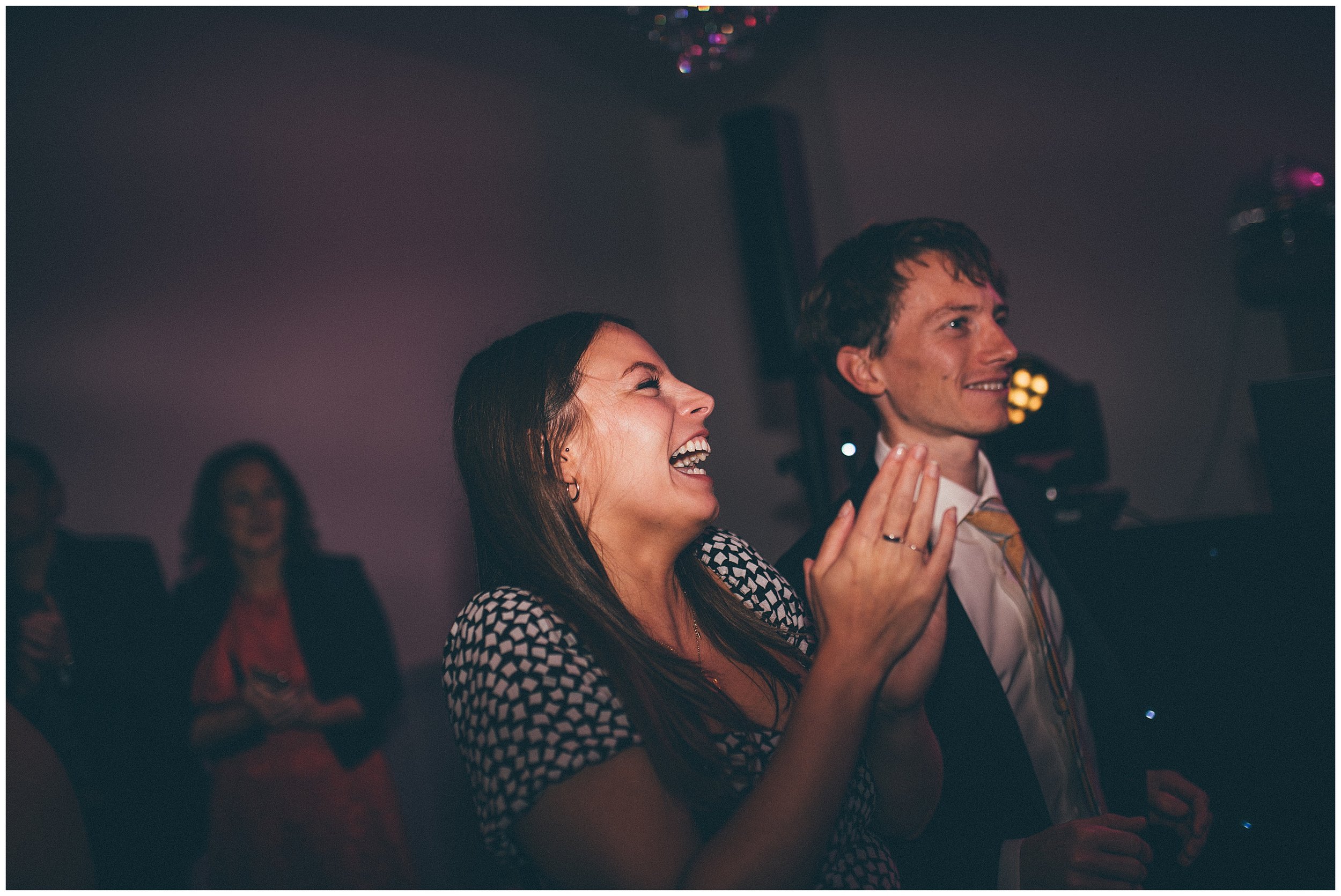 Wedding guests dance during the party at Tyn Dwr Hall