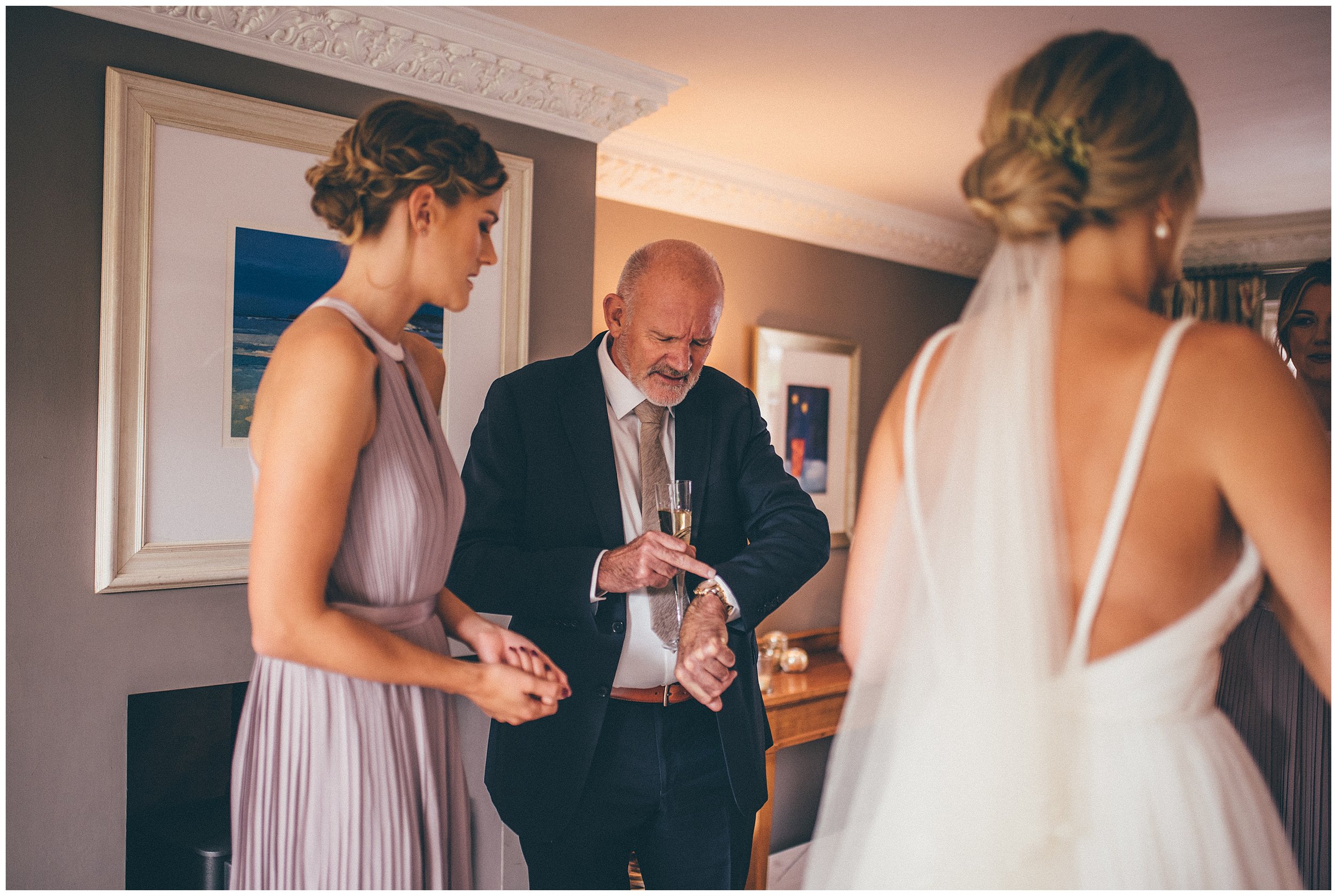 Bride's dad checks his watch ahead of the Cheshire wedding