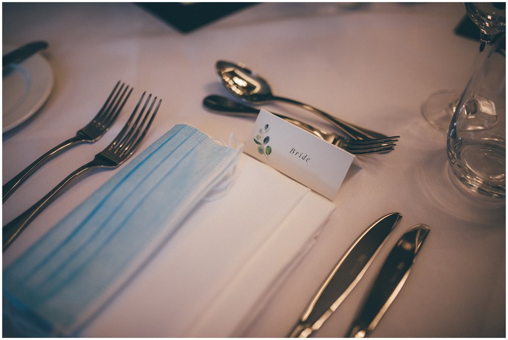 Bride's place setting with a face mask at Old Palace in Chester 