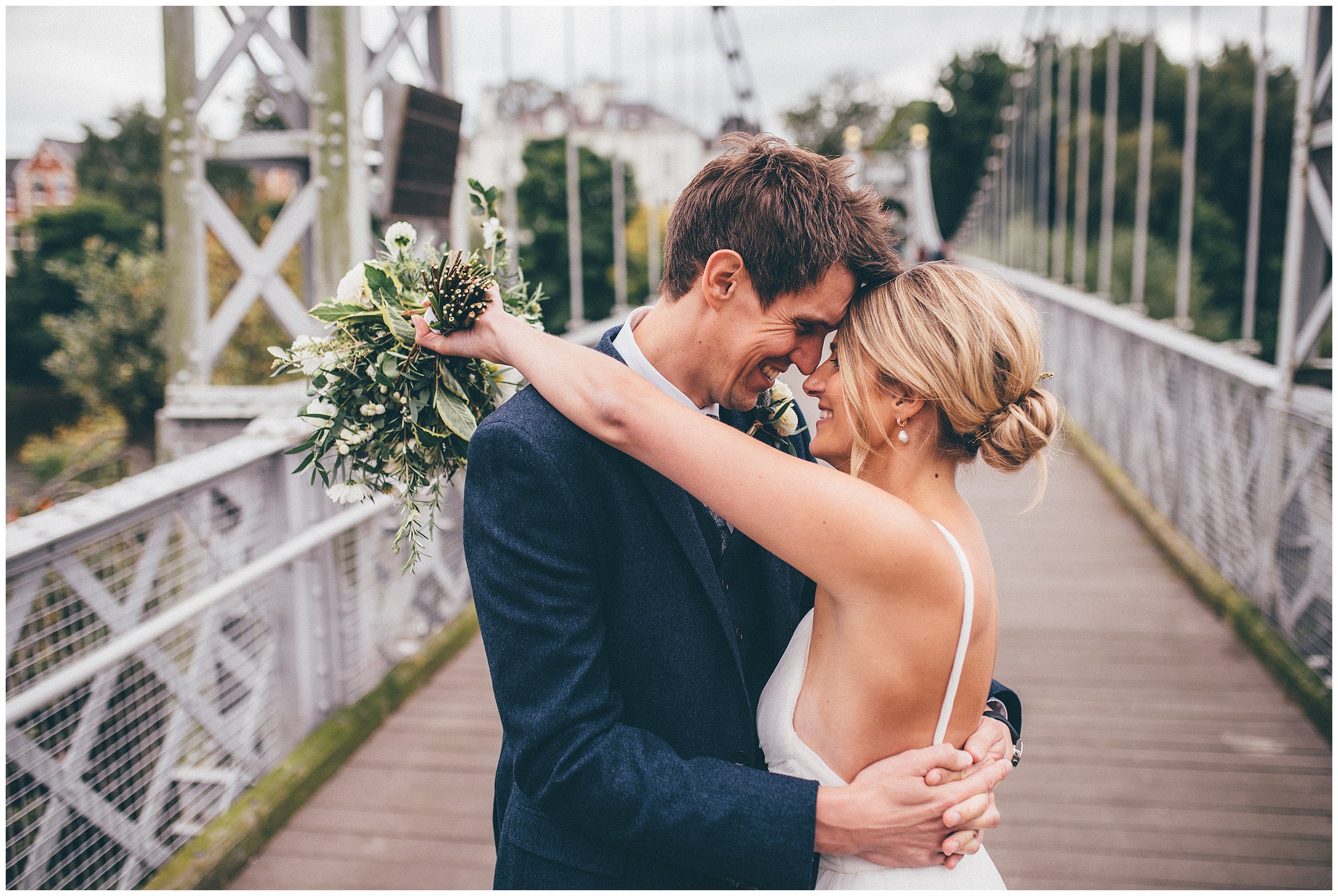 Bride and groom on the bridge in Chester