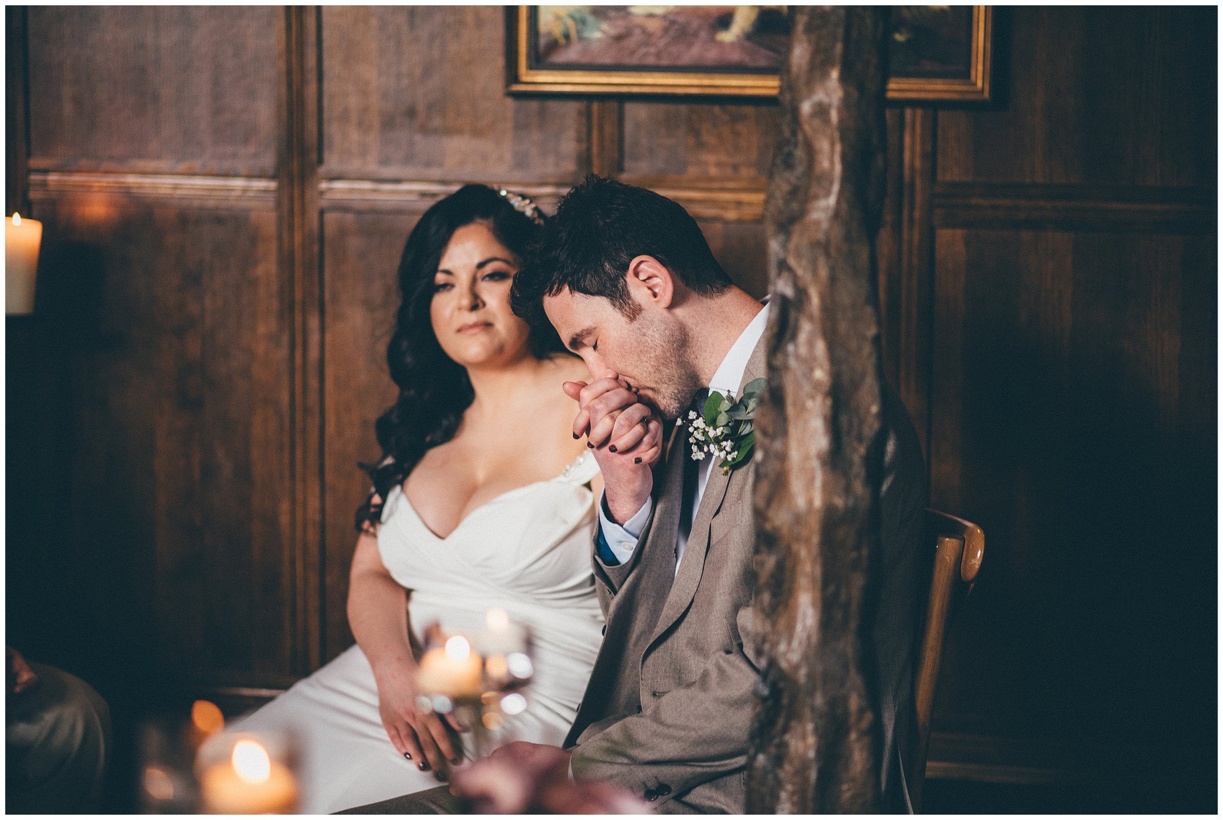 Groom kisses his brides house during the wedding ceremony at Rosehill House wedding