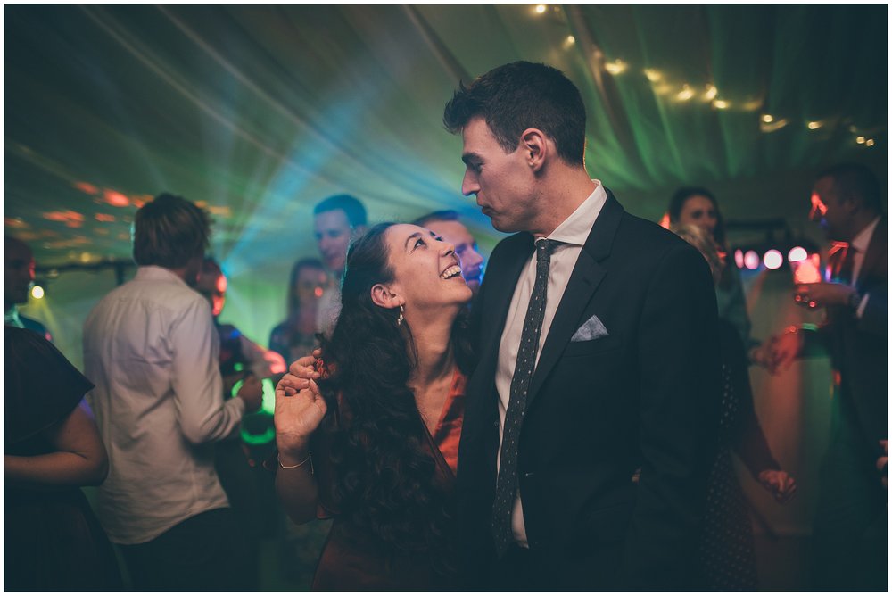 Guests dance together at Silverholme Manor wedding in Lake District