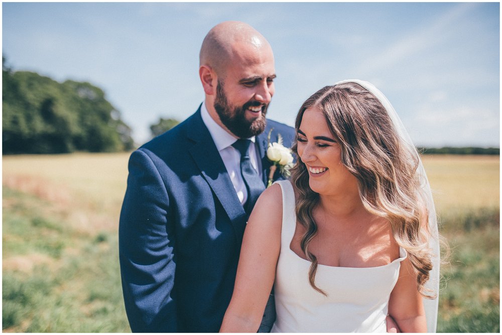 Couple laugh together at Oakwood at Ryther wedding venue