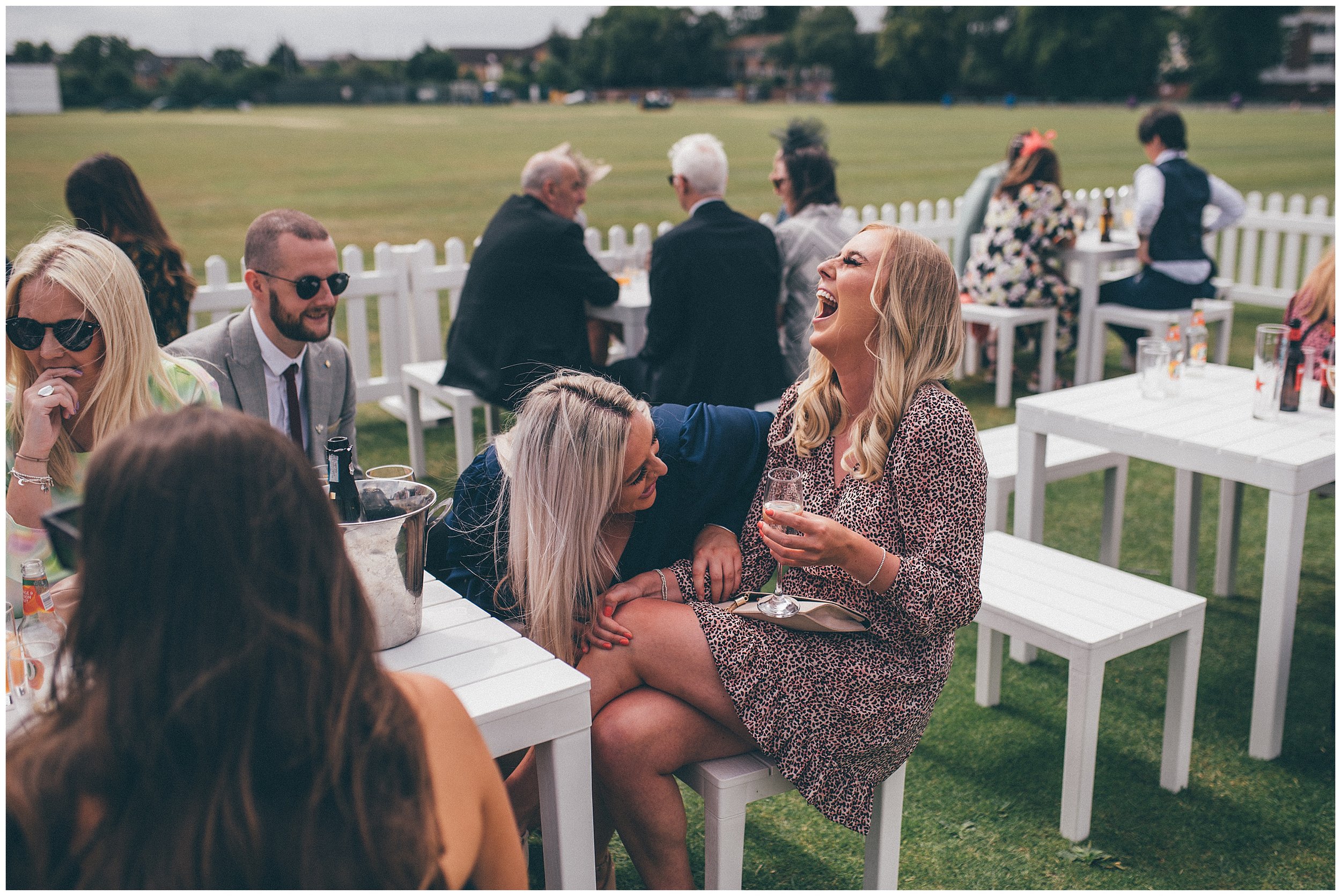 Wedding guests laugh together at Liverpool Wedding venue