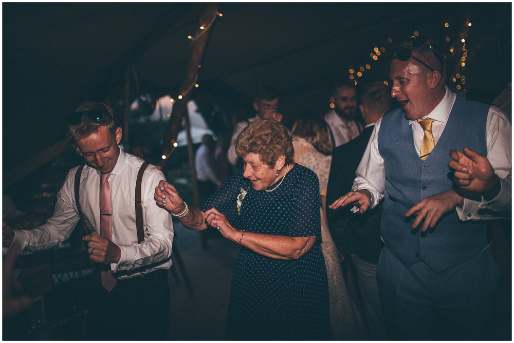 Grandma dances with wedding guests at Skipbridge Country wedding venue