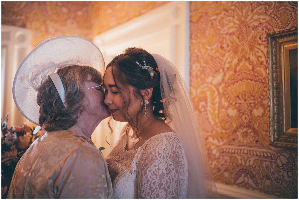 Bride's grandma kisses her at Silverholme Manor in the Lake District