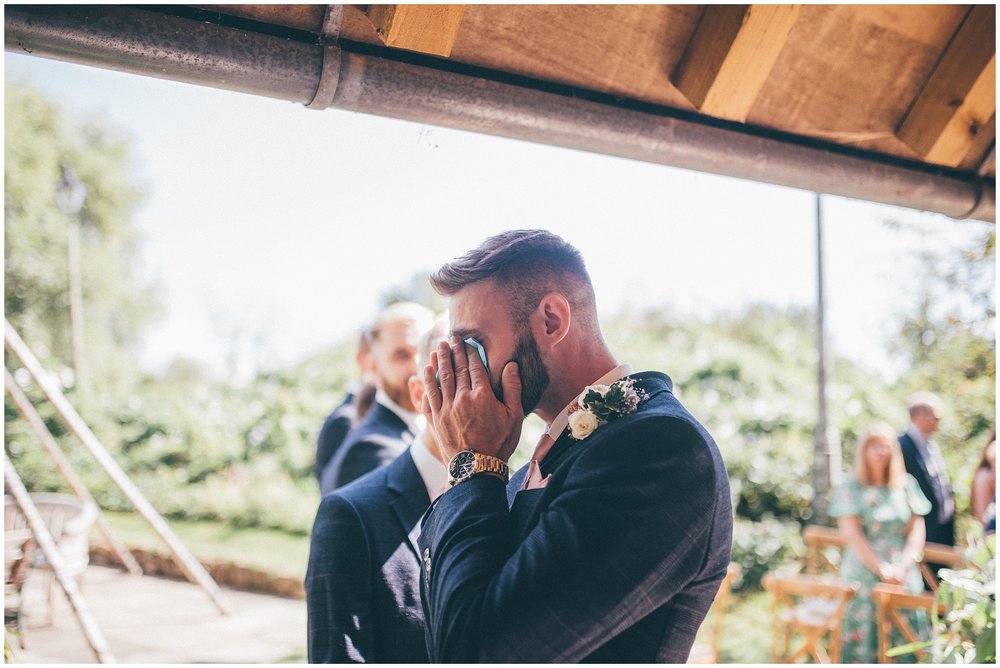 Groom cries as his bride walks down the aisle at Skipbridge country wedding venue
