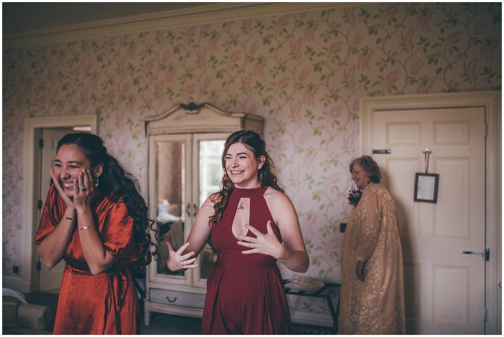 Bridesmaids see the bride for the first time at Silverholme Manor at the Lake District