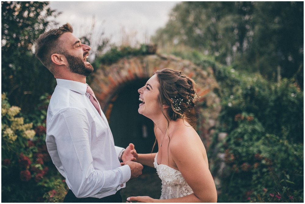 Couple share a joke at Skipbridge Country weddings