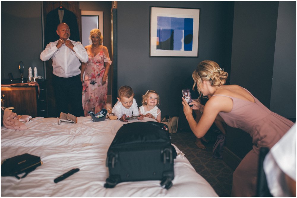 Flowergirl and pageboy pose for a photo before the Yorkshire wedding