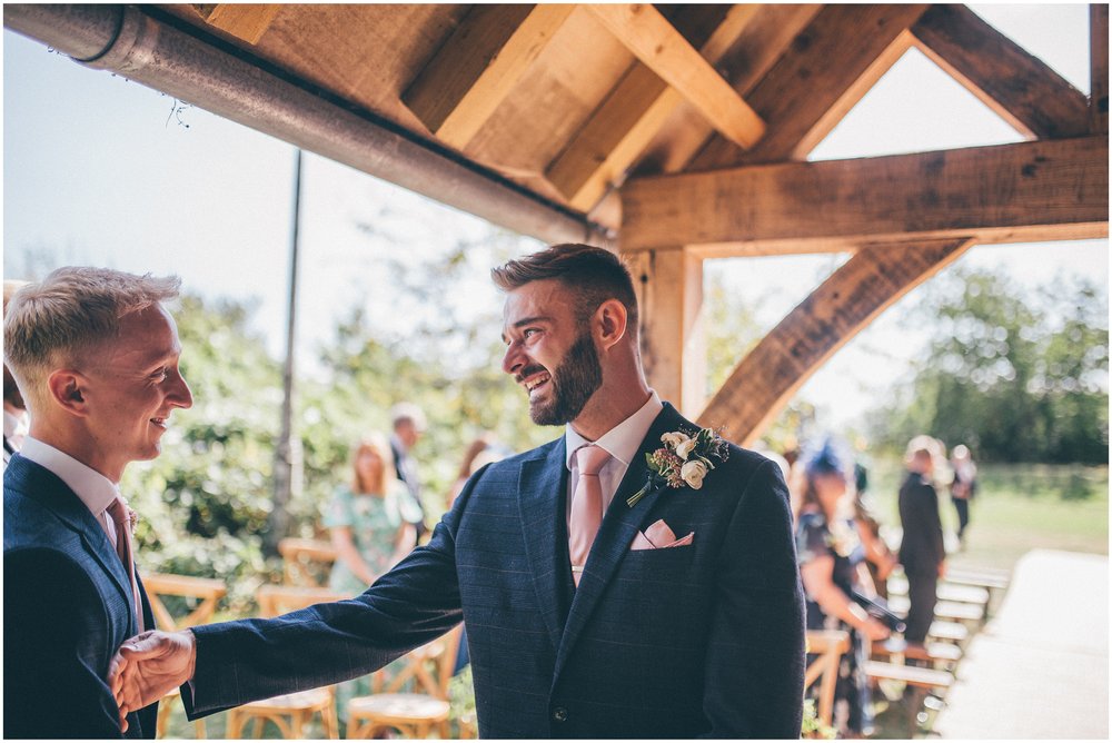 Groom is excited with his Best Man before his bride walks down the aisle at Skipbridge Country Wedding venue in Yorkshire