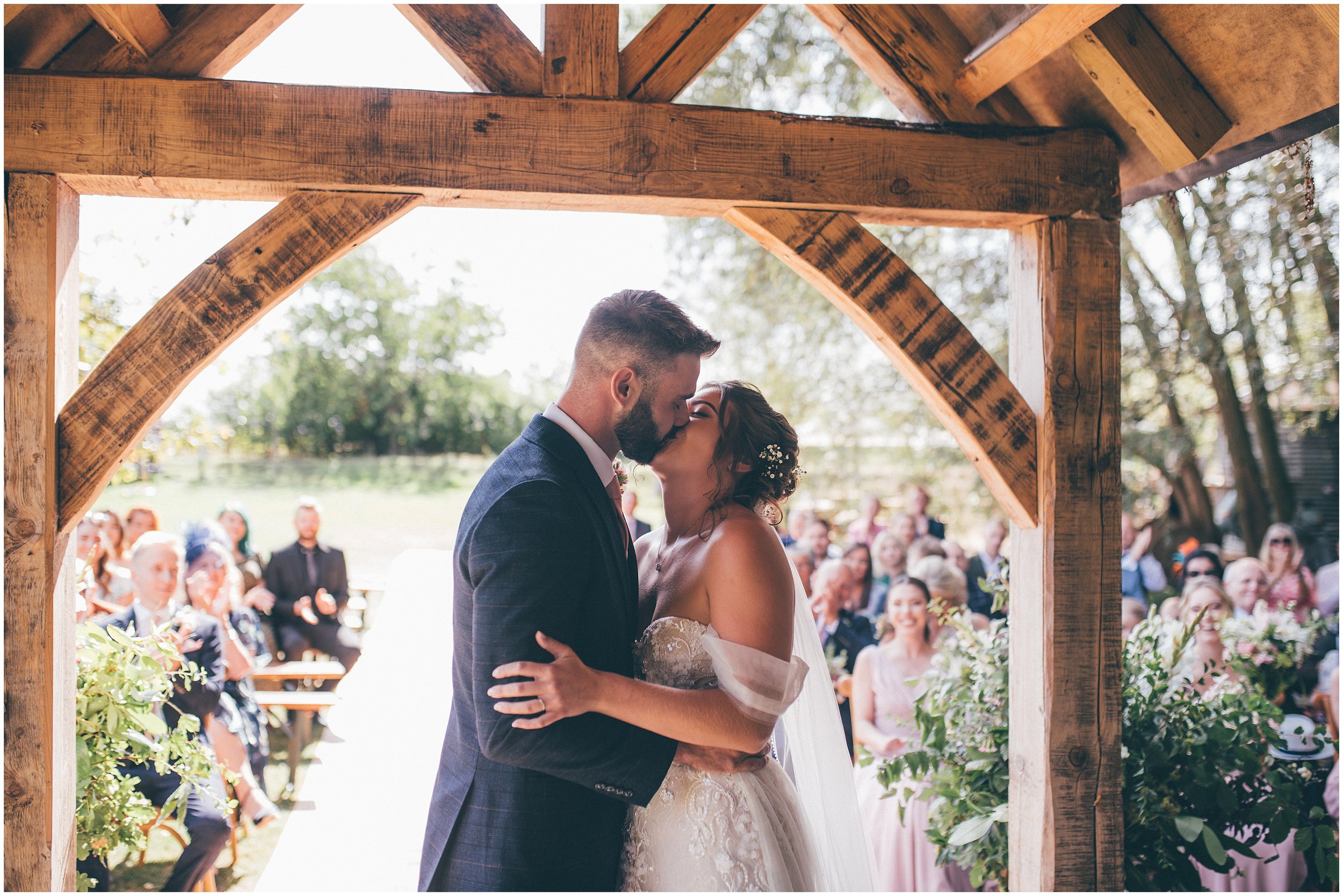Bride and groom have their outdoor wedding ceremony at Skipbridge Country Wedding venue in Yorkshire