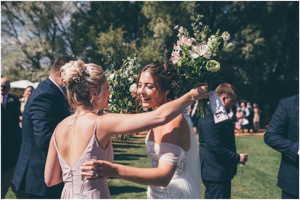 Bride and groom greet their guests at Skipbridge Country Wedding venue in Yorkshire