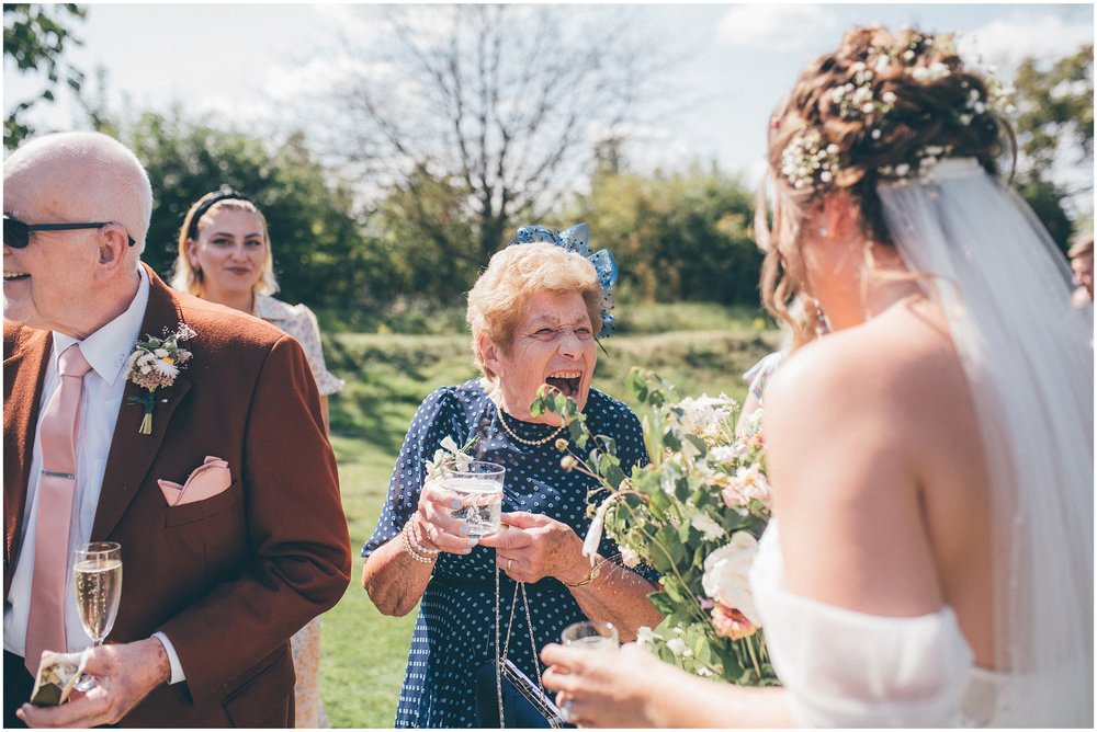 Bride and groom greet their guests at Skipbridge Country Wedding venue in Yorkshire