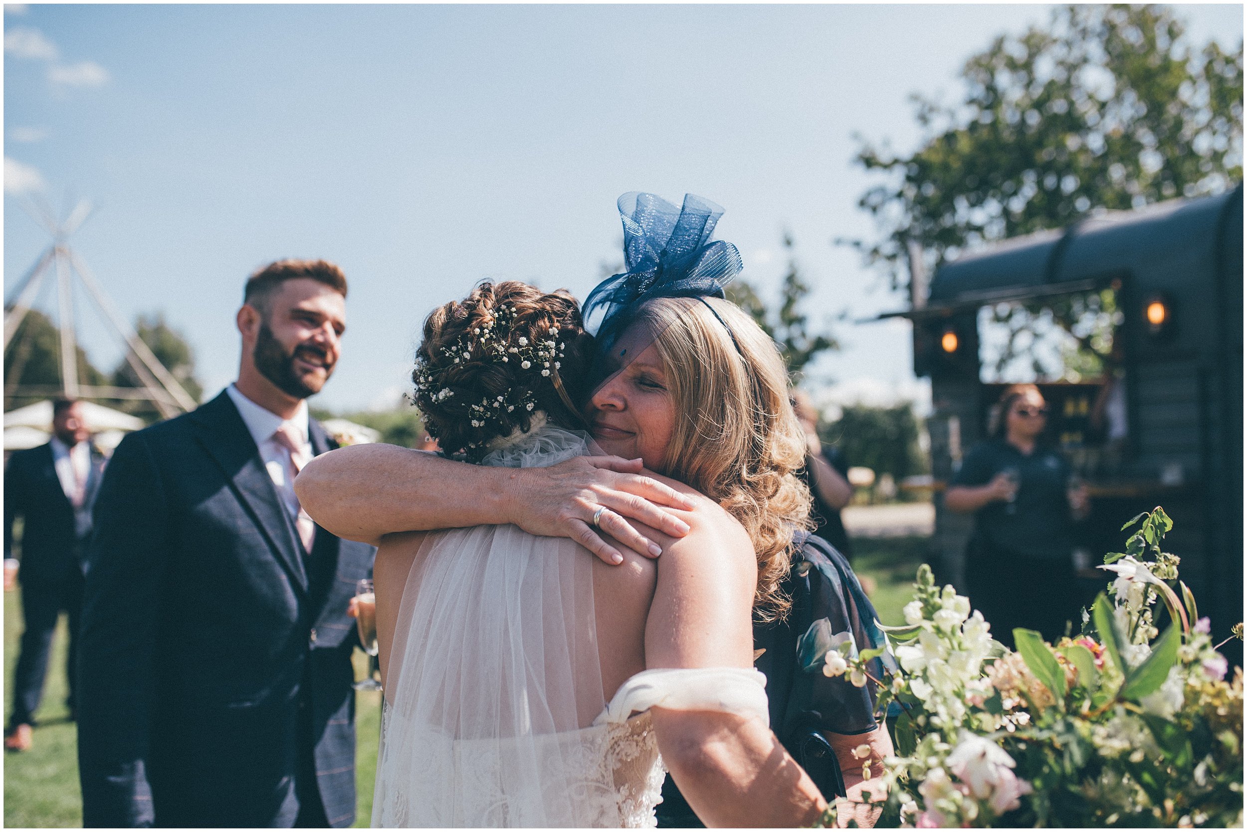 Bride and groom greet their guests at Skipbridge Country Wedding venue in Yorkshire