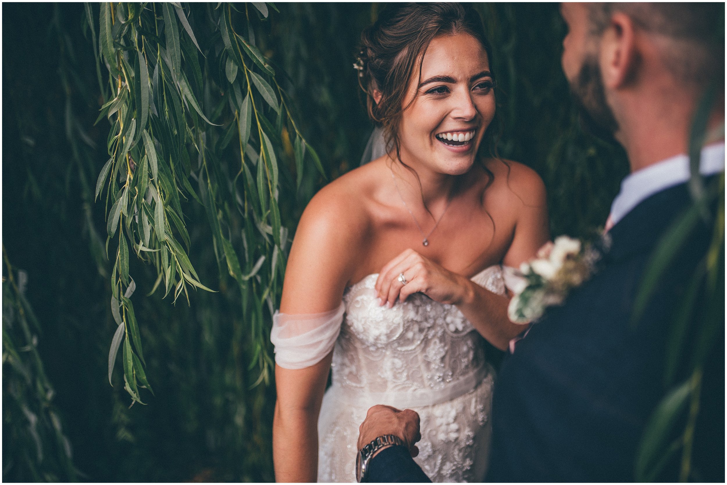 Bride and groom have their couple photographs taken by Cheshire wedding photographer at Skipbridge Country Wedding venue in Yorkshire