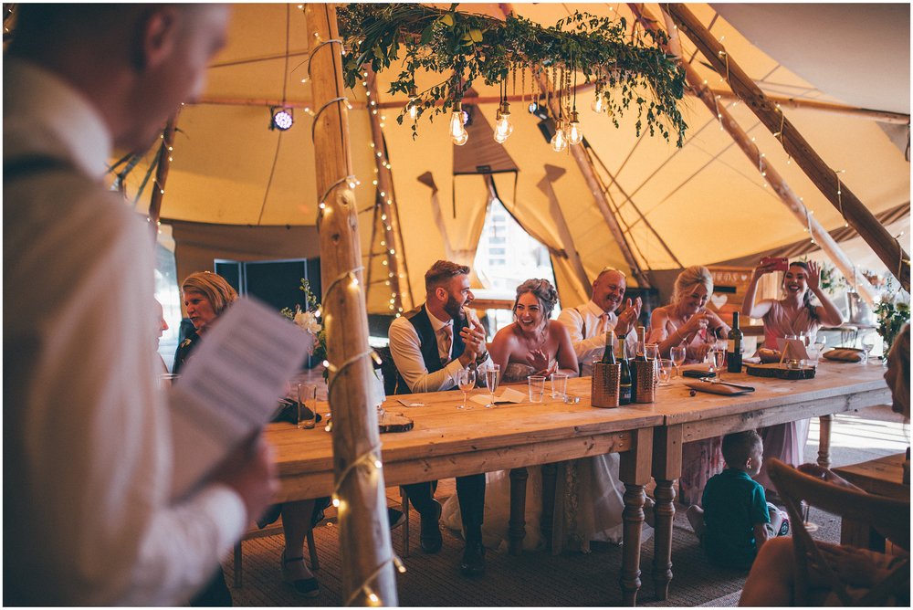 Wedding speeches in the tipi at a summer wedding at Skipbridge Country Wedding venue in YorkshireWedding speeches in the tipi at a summer wedding at Skipbridge Country Wedding venue in Yorkshire