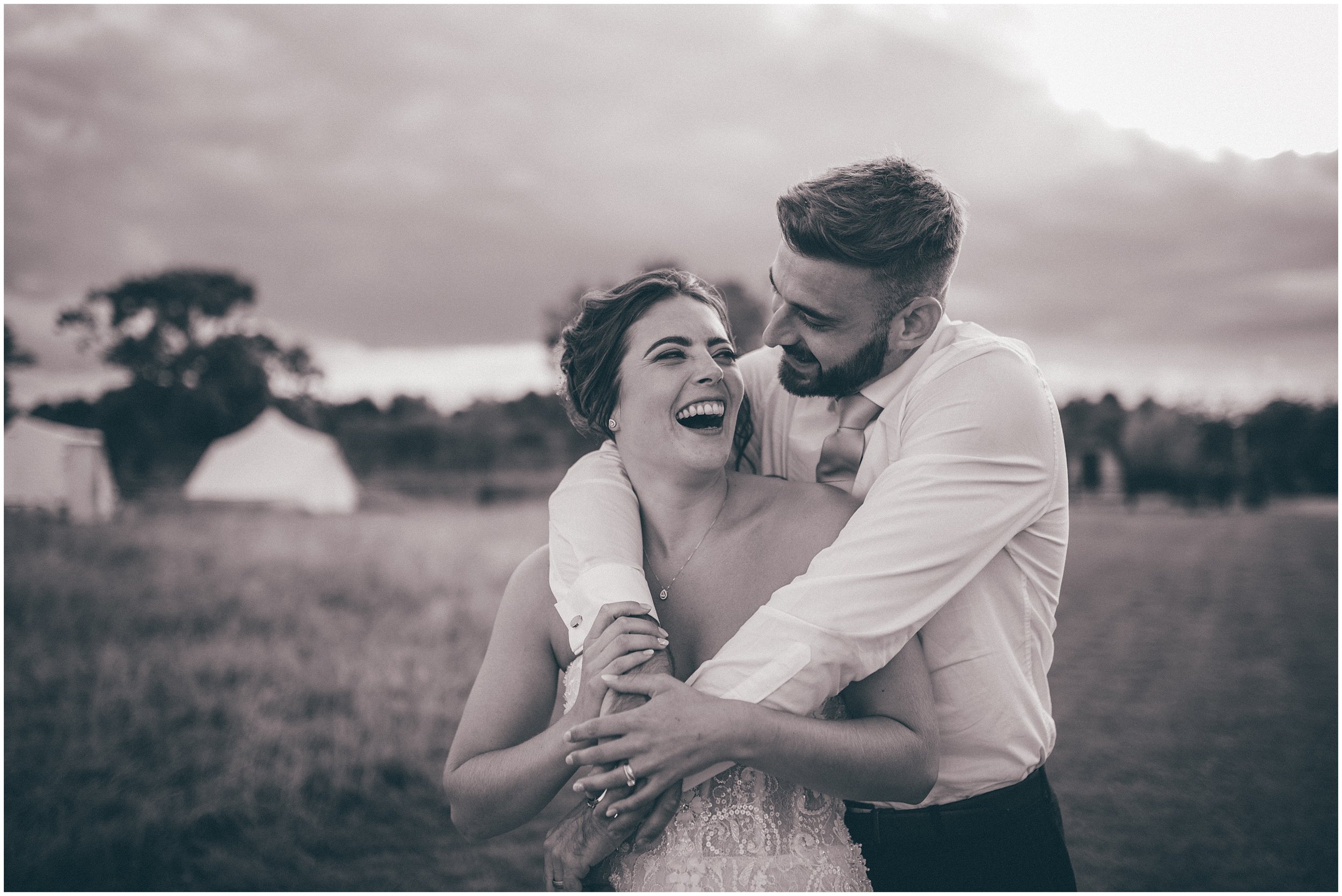 Bride and groom have their wedding photographs taken by Cheshire wedding photographer at Skipbridge Country wedding venue in Yorkshire