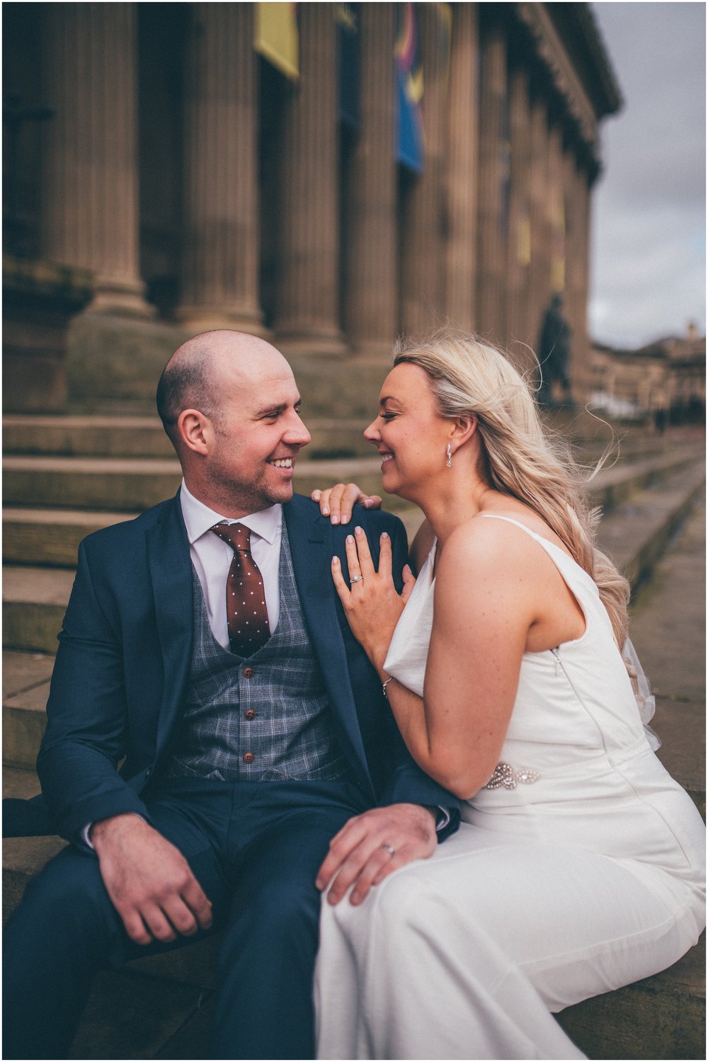 Bride and groom have their wedding portraits taken after their elopement Bride and groom get married in their elopement Bride and Groom elope in Liverpool city centre at St George's Hall in Liverpool