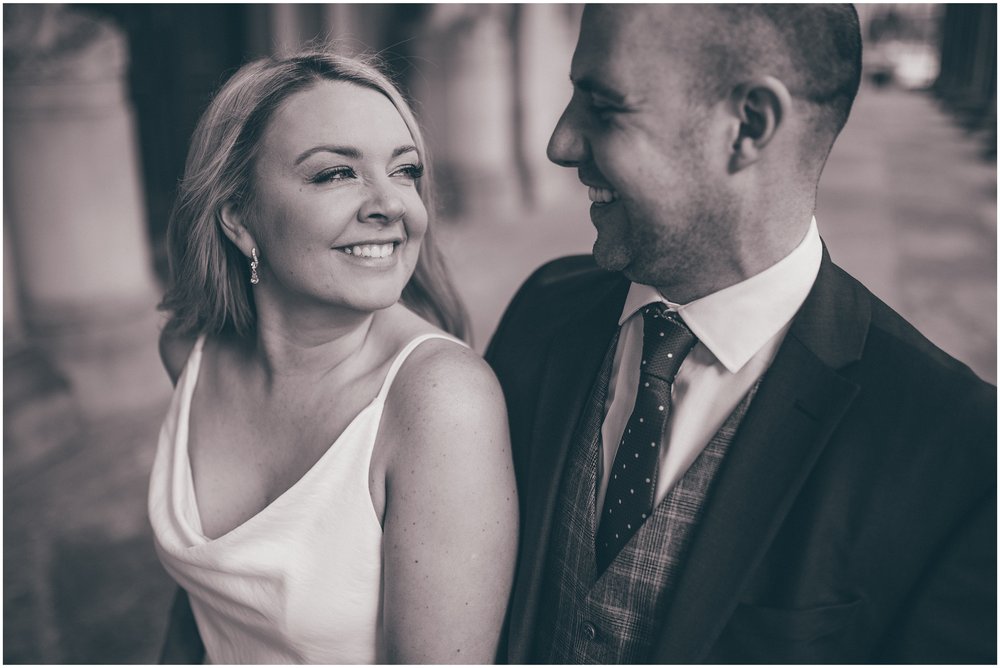 Bride and groom have their wedding portraits taken after their elopement Bride and groom get married in their elopement Bride and Groom elope in Liverpool city centre at St George's Hall in Liverpool