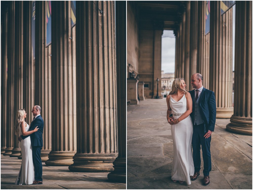 Bride and groom have their wedding portraits taken after their elopement Bride and groom get married in their elopement Bride and Groom elope in Liverpool city centre at St George's Hall in Liverpool