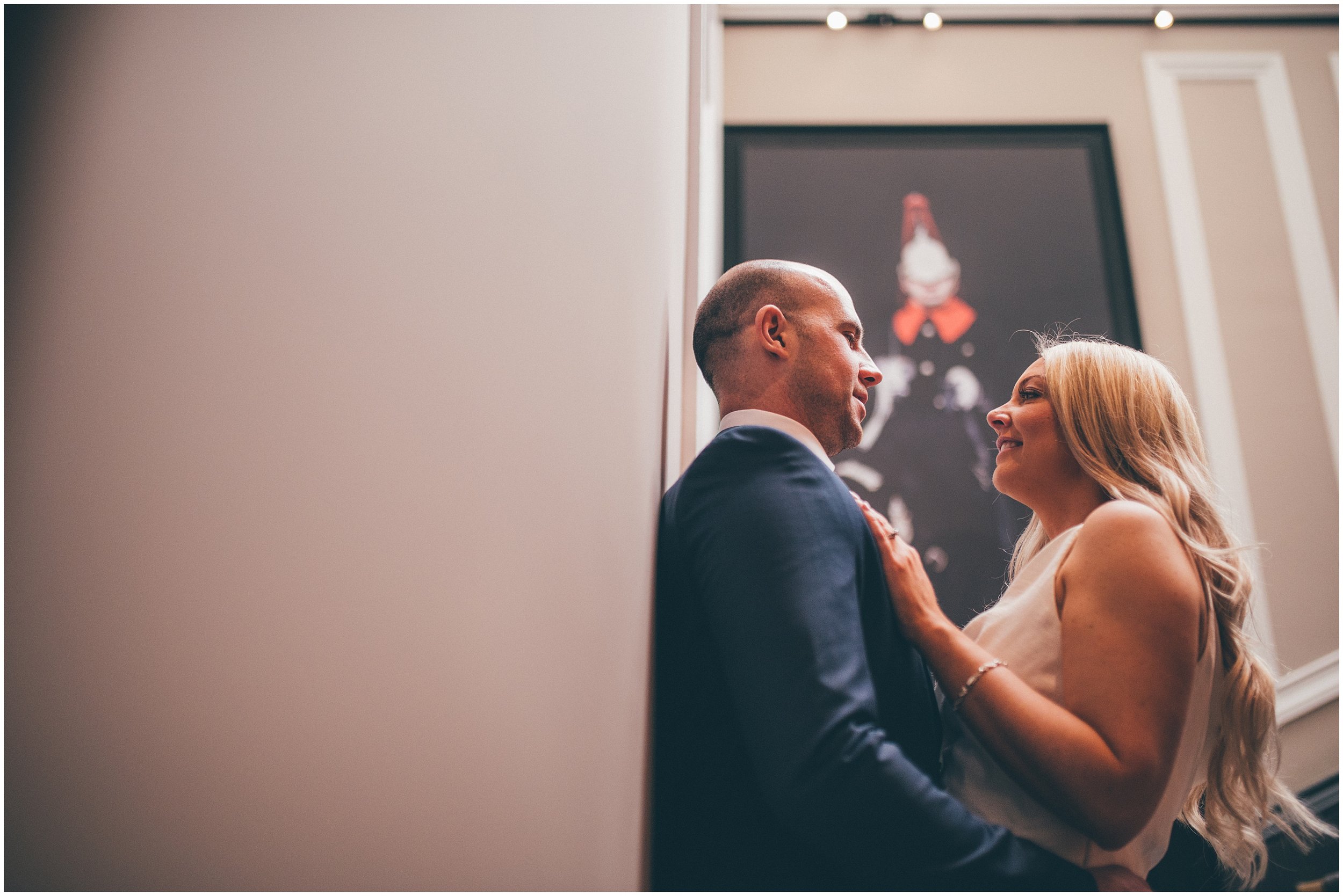 Bride and groom have wedding Photographs taken in Radisson Red after their elopement at St George's Hall in Liverpool City Centre