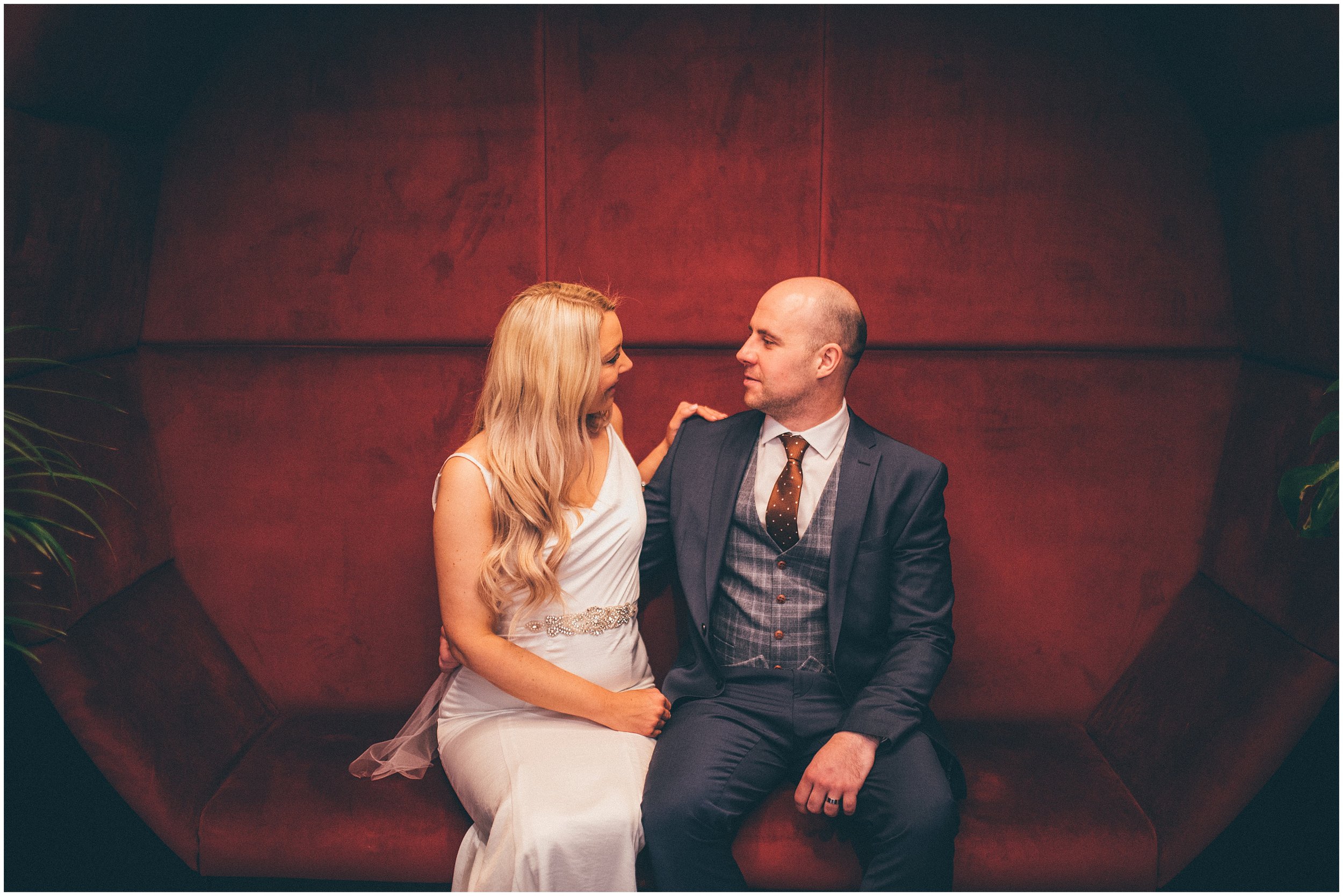 Bride and groom have wedding Photographs taken in Radisson Red after their elopement at St George's Hall in Liverpool City Centre