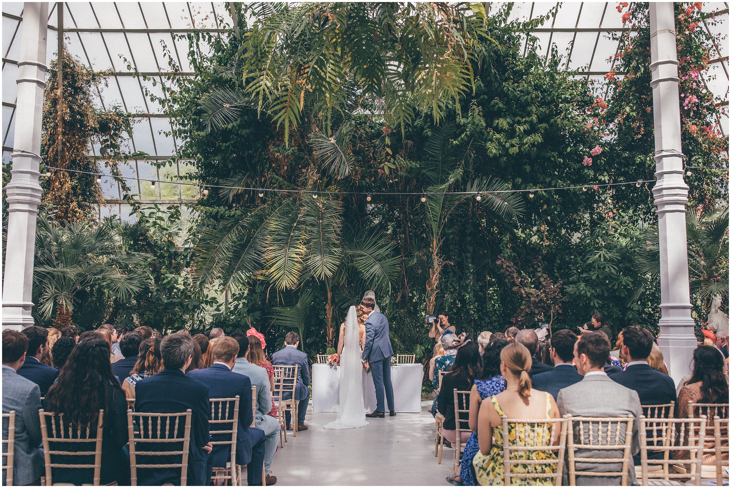 Wedding ceremony by Cheshire and Liverpool Wedding photographer at a Sefton Palm House wedding 