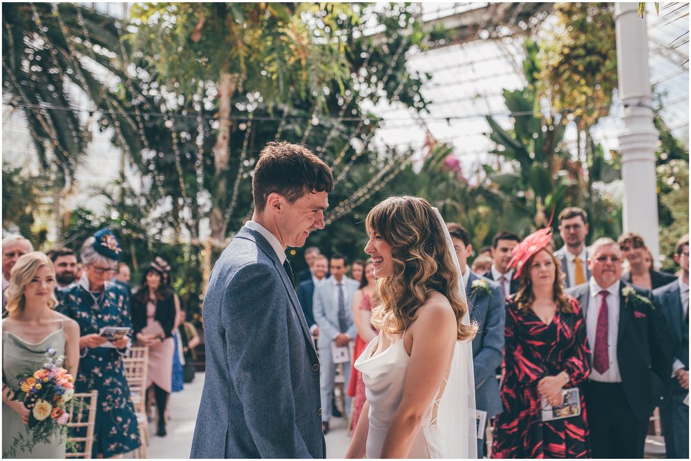 Wedding ceremony by Cheshire and Liverpool Wedding photographer at a Sefton Palm House wedding 