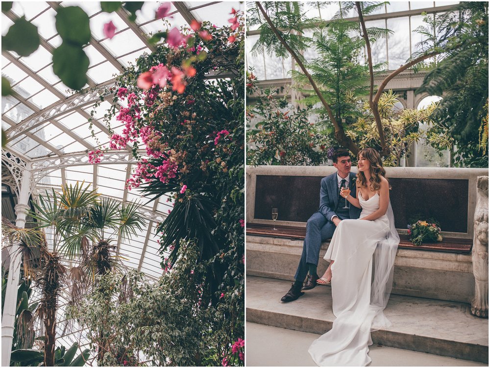 Bride and groom on their wedding day inside Sefton Palm House in Liverpool.