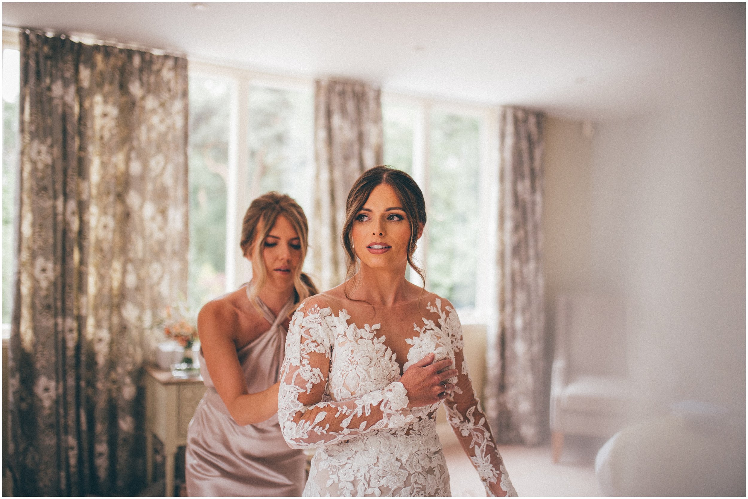 Bride gets ready for her wedding at Abbeywood Estate in Delamere, Cheshire