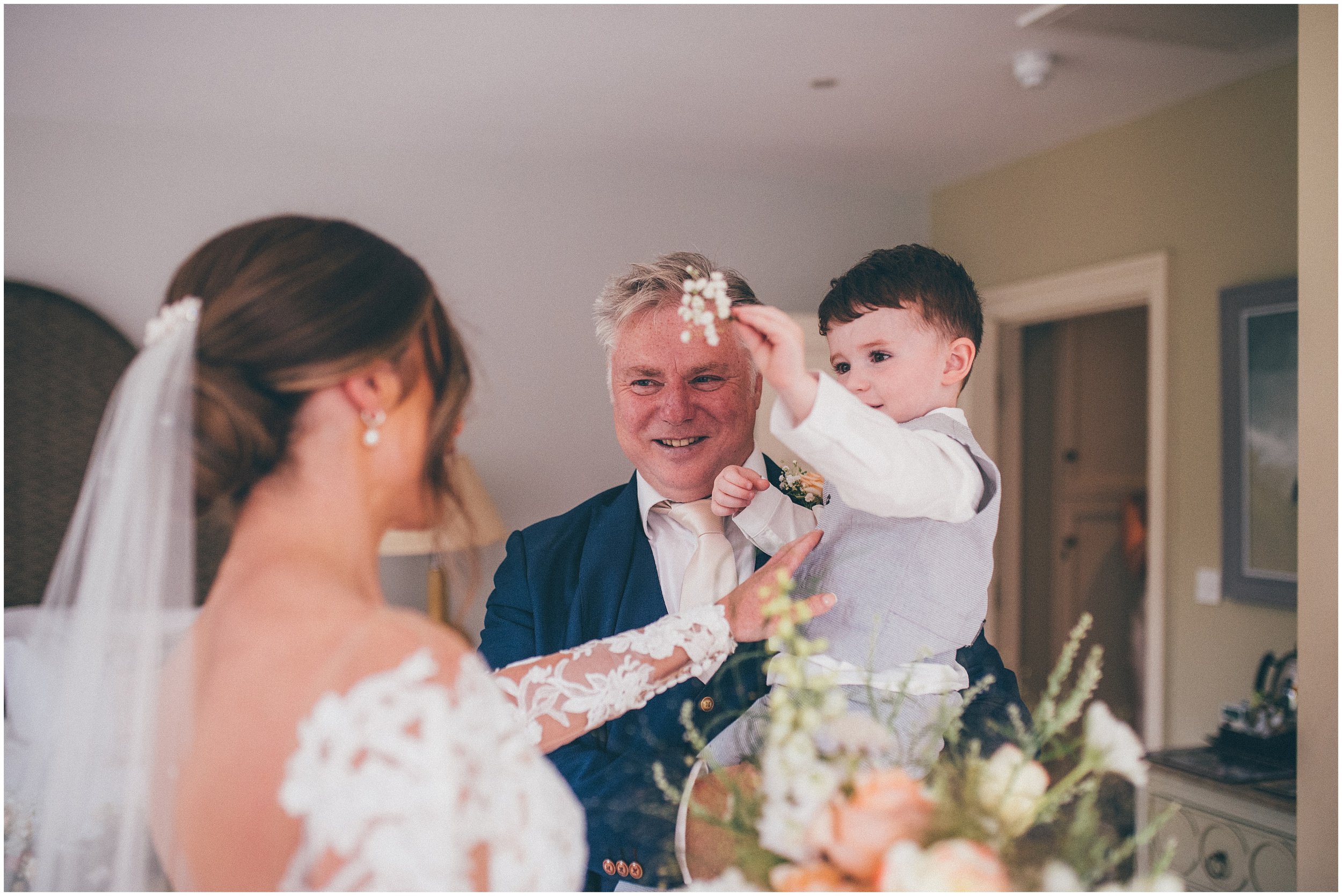 Father of the Bride sees his daughter as a bride for the first time at Abbeywood Estate in Delamere, Cheshire