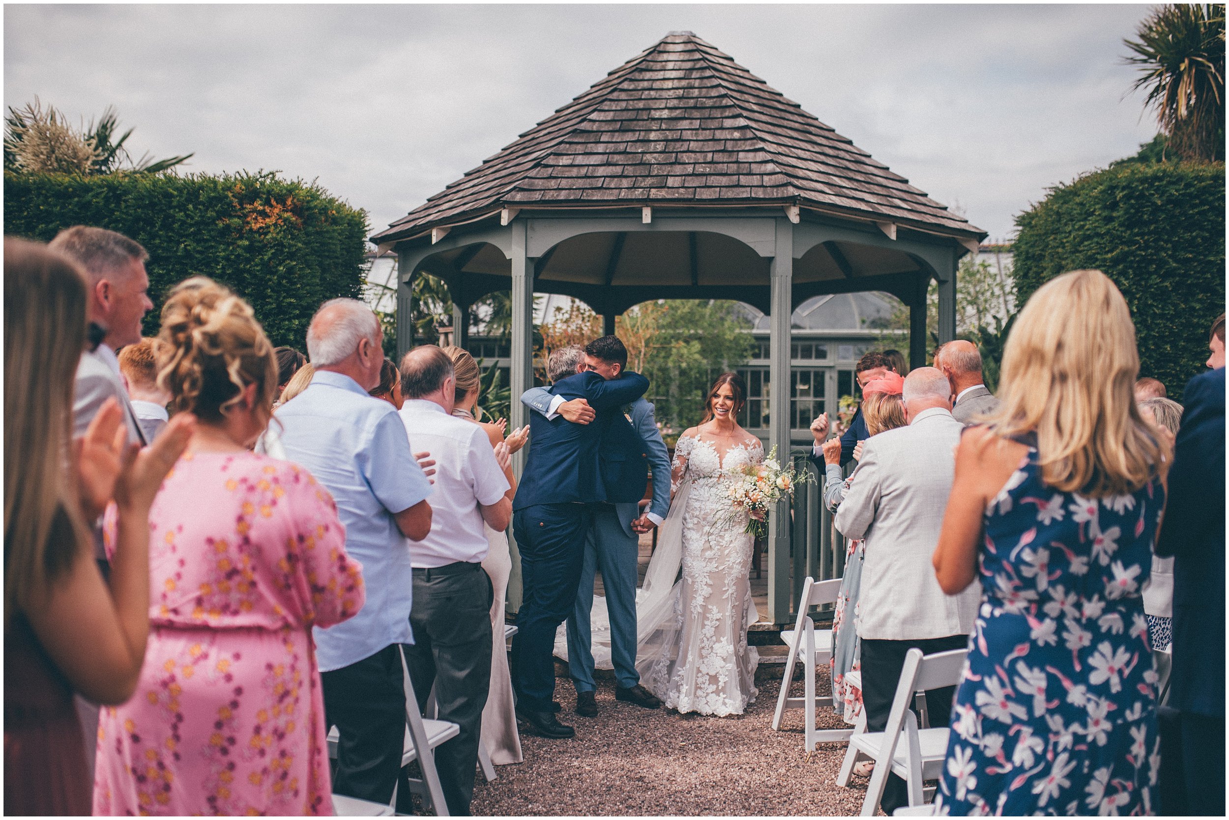 Bride and groom have an outdoor wedding ceremony in Cheshire at Abbeywood Estate wedding venue in Delamere.