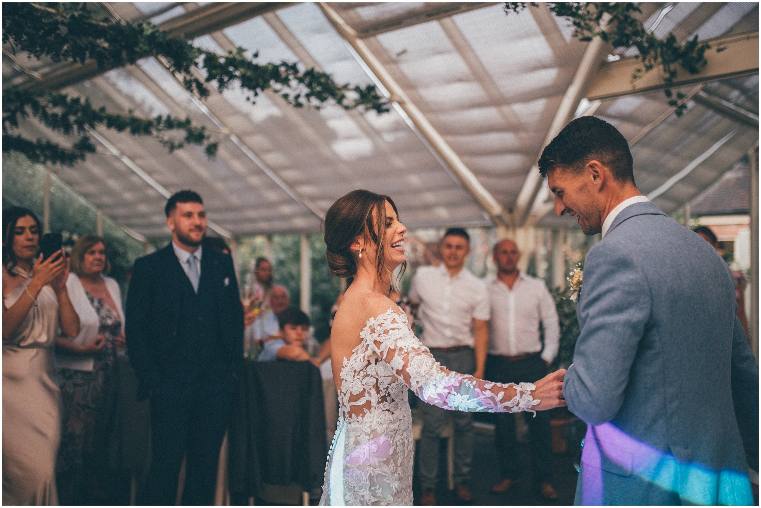 Bride and groom enjoy the dancefloor during their First Dance at Abbeywood Estate wedding venue in Delamere, Cheshire.