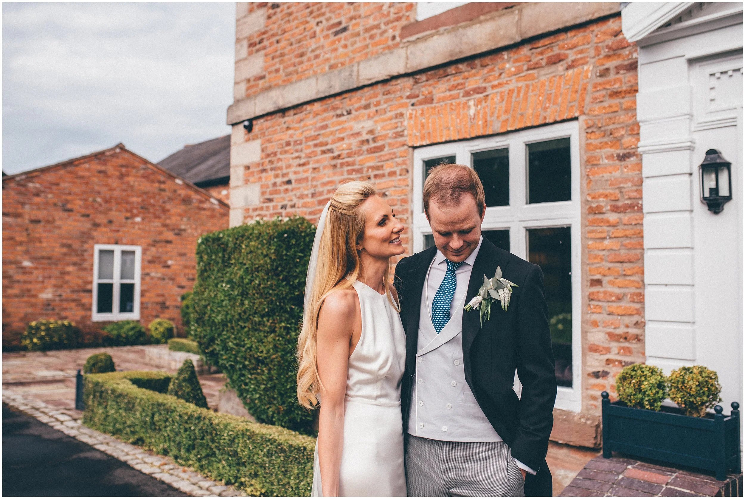 The newlyweds during their wedding reception in Chester, photograph taken by Cheshire Wedding Photographer, Helen Jane Smiddy Photography