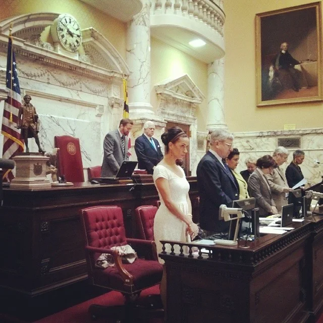 Praying an invocation for the Maryland State Senate.