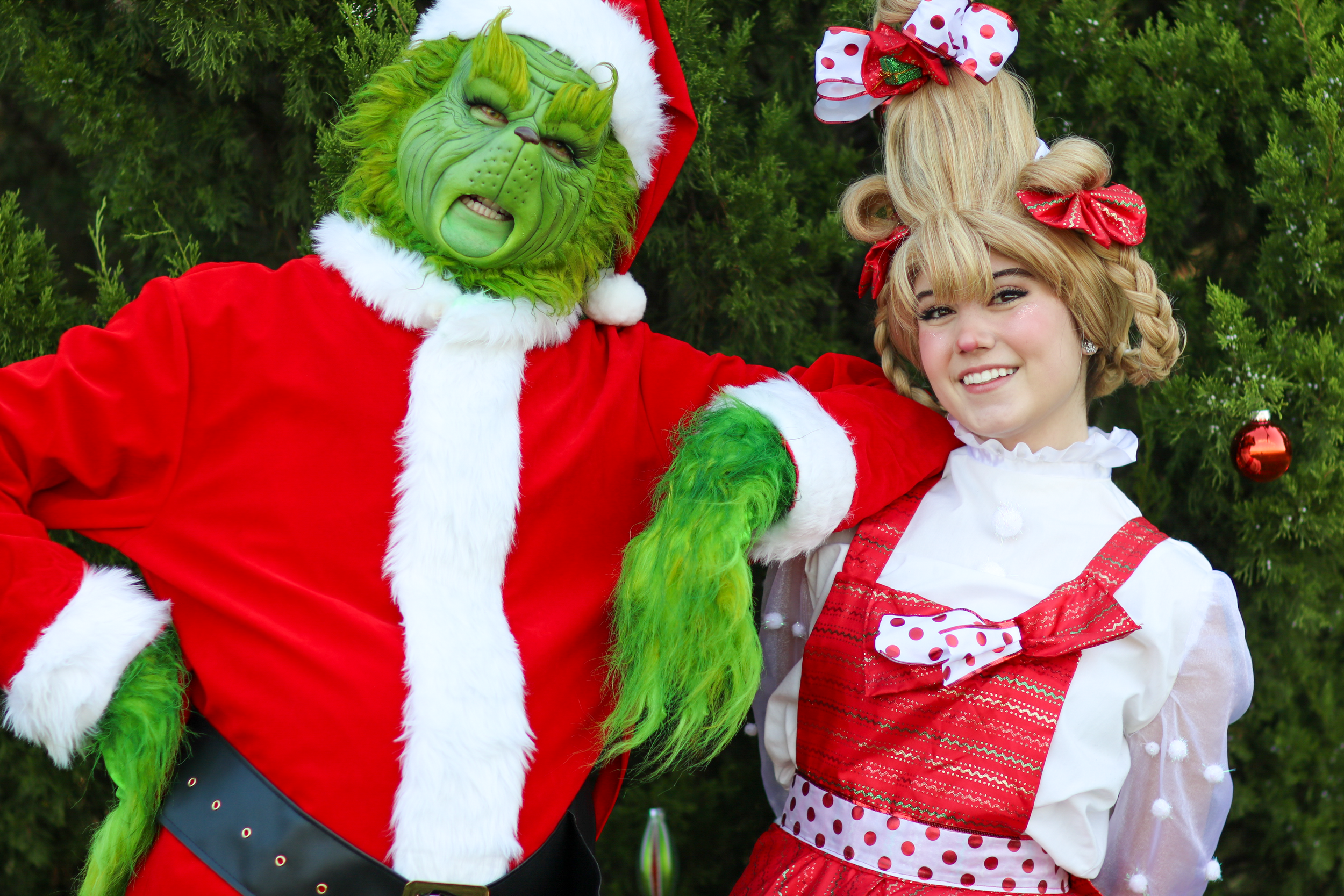 Mean Green One and Christmas Present Whosie at Holidays in the Heights 