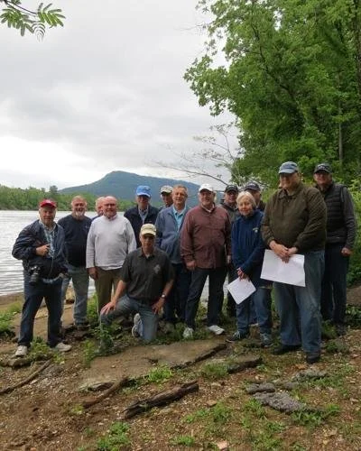  Greg Wade (kneeling) would sometimes lead a Civil War Round Table group on a field trip of sorts, as he did here at sights in Chattenooga. 