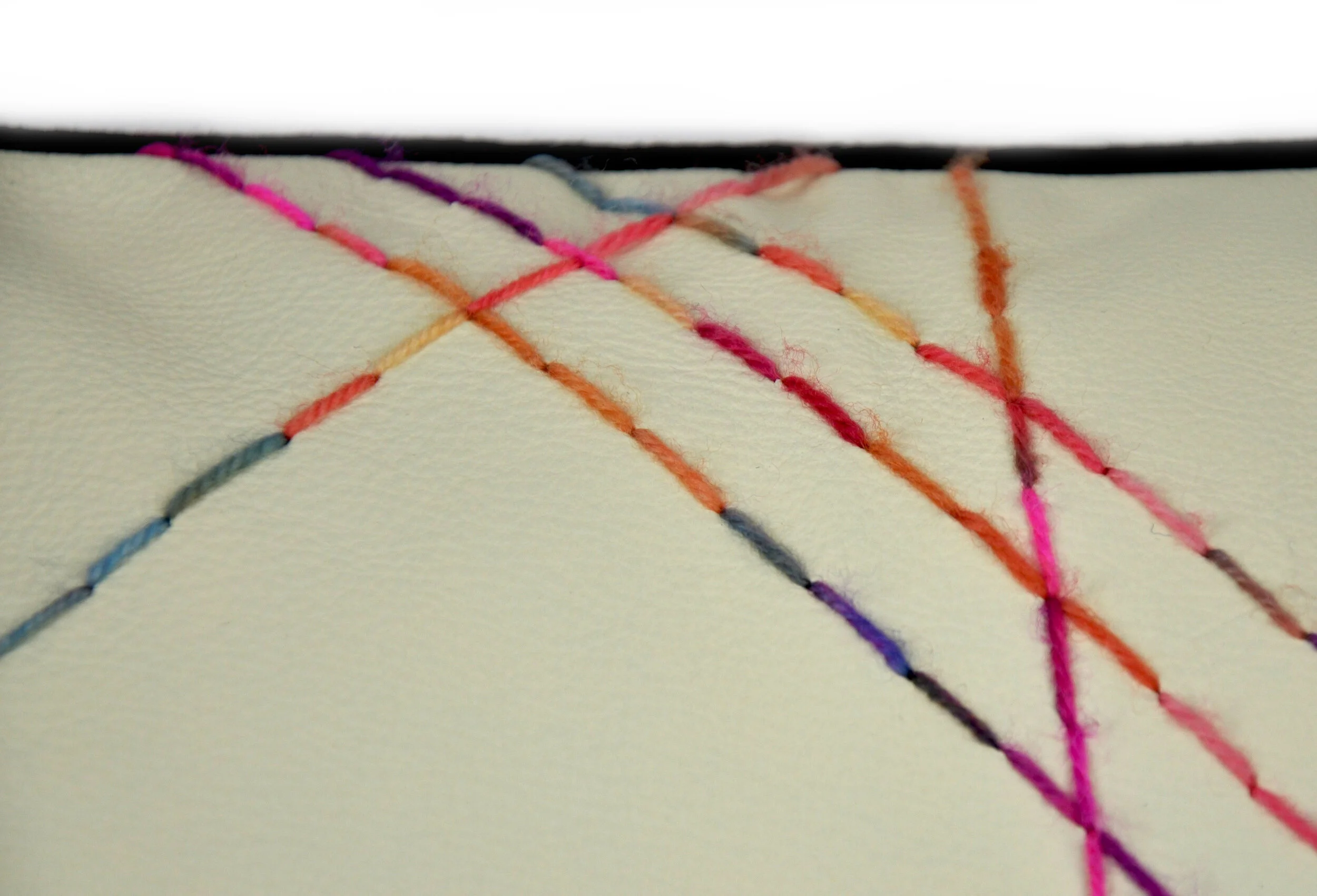 Yarn-on-leather-10-close-up.jpg