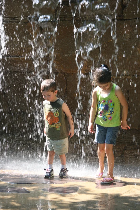 Kids in a waterfall