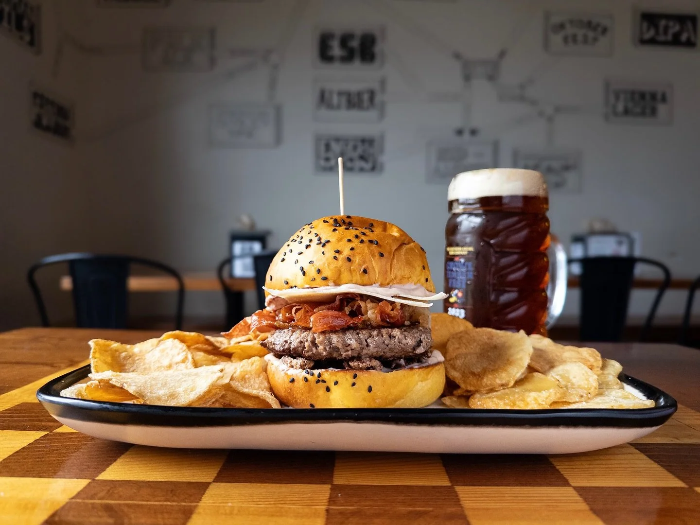 Weekly Sandwich Special:
CRAN-BURIED ALIVE BURGER
topped with candied pecans, prosciutto, cranberry rosemary aioli, and shaved Parmesan on a house pumpkin bun. 
Pair with BAMBERG EMBER LAGER, available on draft and in 16oz cans to-go. 

Sandwich Spec