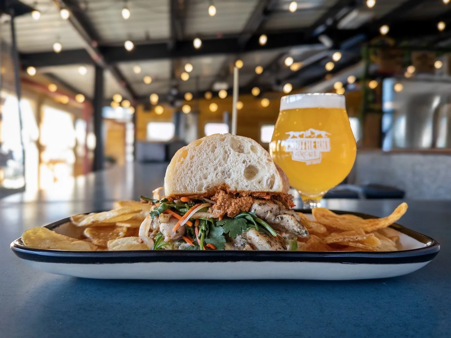 Weekly Sandwich Special: 
BAWK BAWK BANH MI
marinated grilled chicken thigh, pickled carrots, cabbage, and radish, fresh jalape&ntilde;o, walnut pate, and mayo on house stirato. 
Pair with WITTY BANTER, Belgian Witbier available on draft and in 16oz 
