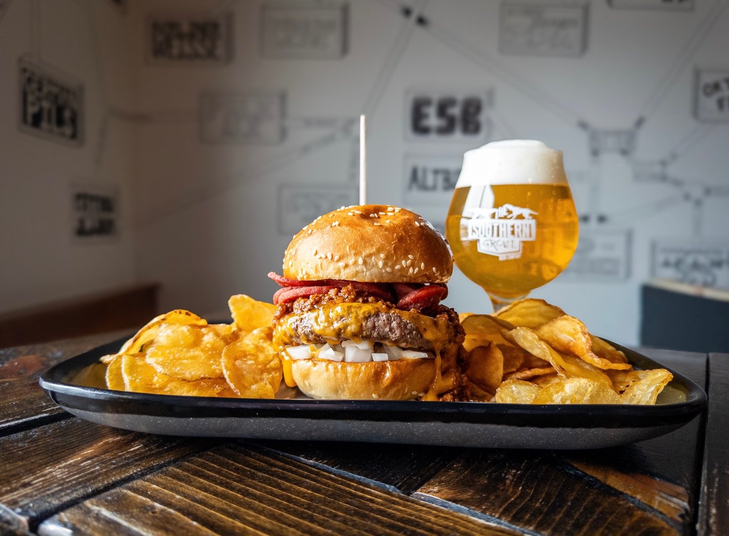 Weekly Sandwich Special:
THE BYLINE IS SKYLINE BURGER
topped with Cincinnati chili, cheddar, white onion, and hot dog crisps on a house bun. 
Pair with DILLUMINATI, Pickle Lager available on draft and in 16oz cans to-go. 

Sandwich Special available 