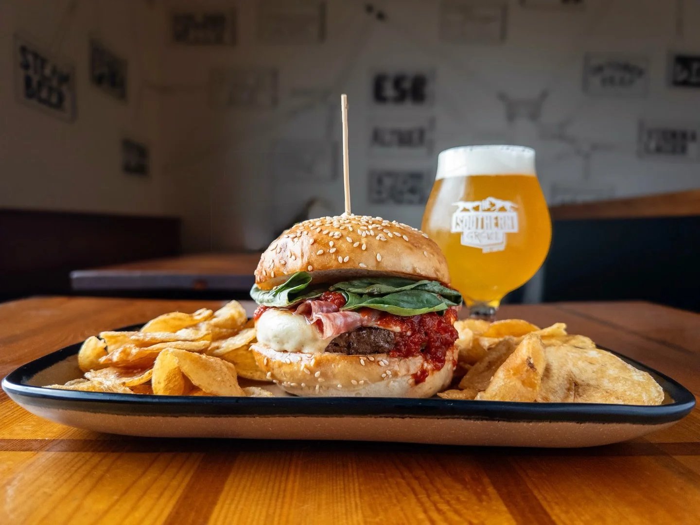 Weekly Sandwich Special:
LOVE AT FIRST SLICE BURGER 
topped with spicy marinara, hot soppressata, fresh mozzarella, fresh basil, and pepperoncini on a house bun. 
Pair with PLENTY OF PLUSH: COSMIC ARCADE, Hazy IPA available on draft now. 

Sandwich S