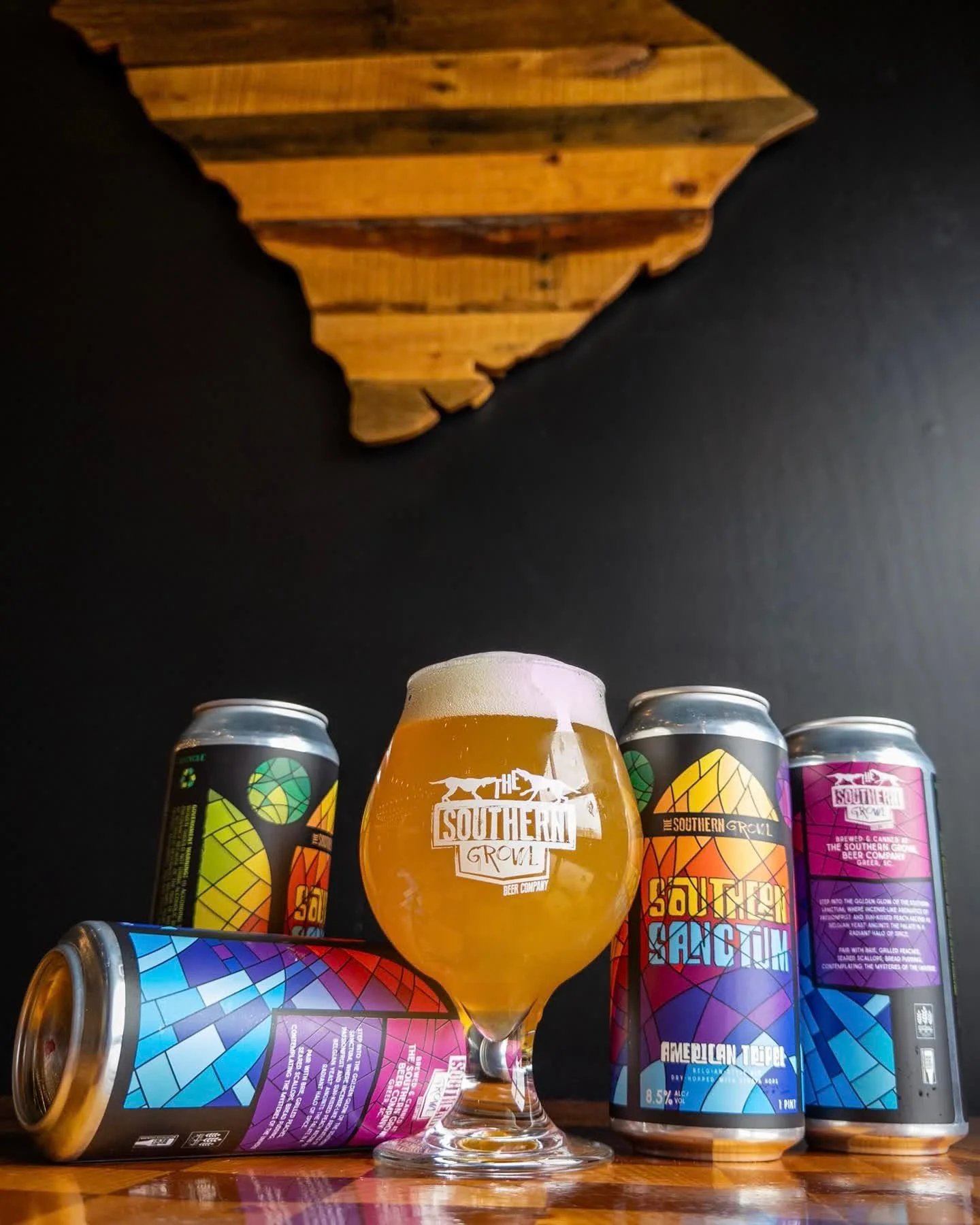 SOUTHERN SANCTUM
American Tripel, 8.5%

Step into the golden glow of the Southern Sanctum, where incense-like aromatics of passionfruit and sun-kissed peach ascend as Belgian yeast anoints the palate in a radiant halo of spice. 

Southern Sanctum ava