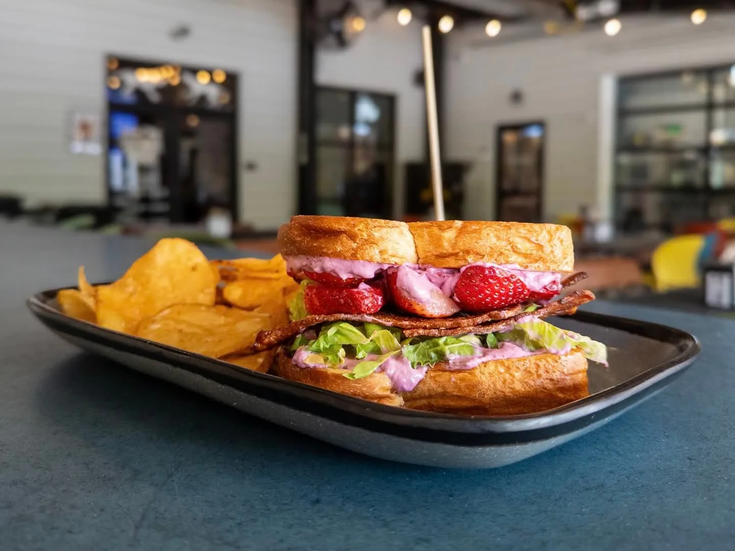 B.L.S. 
(bacon-lettuce-strawberries)
Fresh strawberries, black pepper bacon, lettuce, and blackberry goat cheese spread on house bread. 
Pair with RIGHT DOG RED, Irish Red available on draft and in 16oz cans to-go. 

B.L.S. available during dinner. F