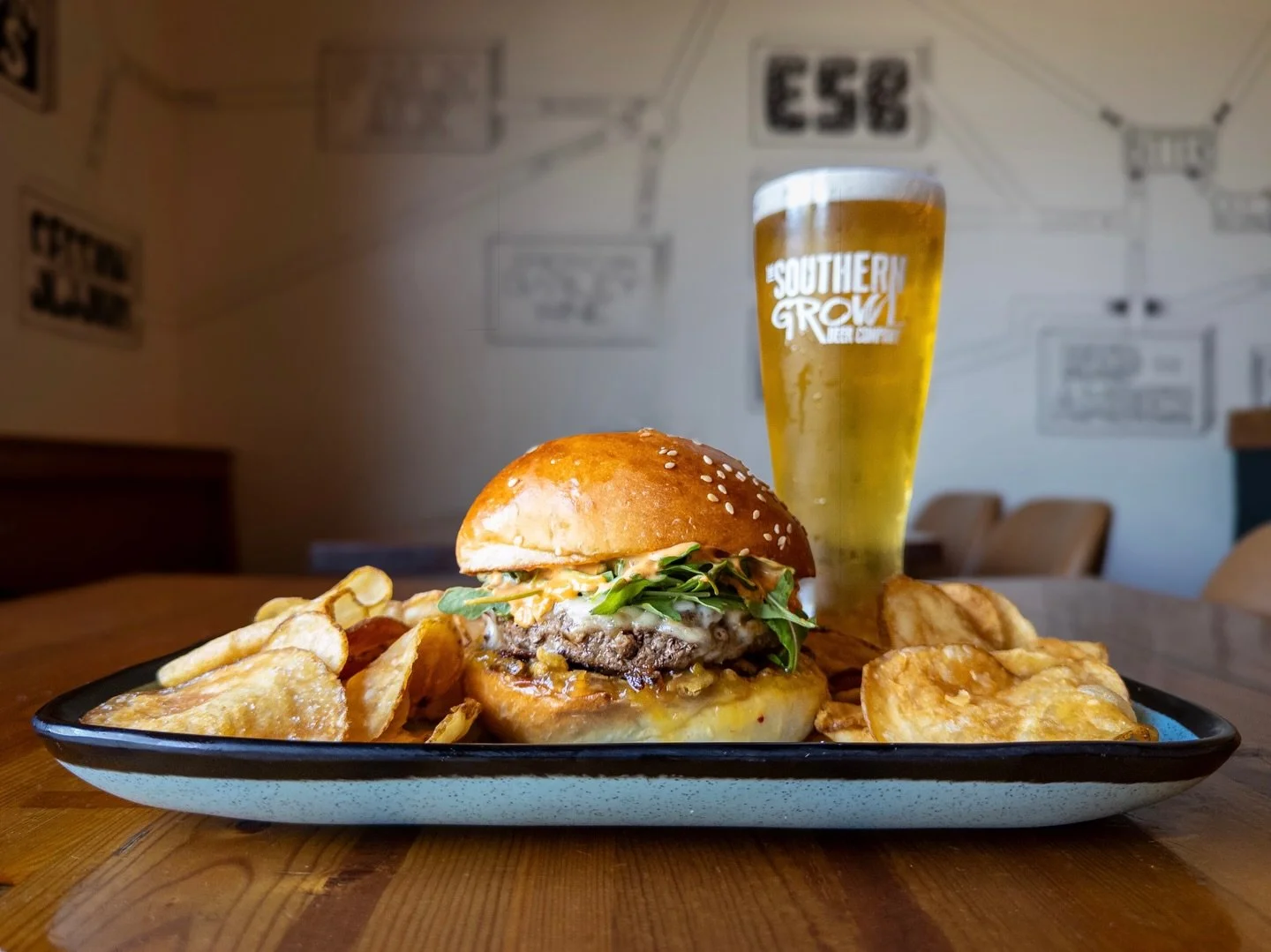 Weekly Sandwich Special, as picked by you all in our Burger Bracket competition:
SPICE IS LIFE BURGER 
topped with spicy peach jam, crispy jalape&ntilde;os, pepper jack cheese, arugula, and chipotle mayo on a house bun. 
Pair with PURR PILS, German S